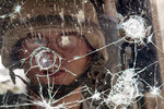 Bomb Shatters Glass, but Film Holds Dealy Shards in Tact