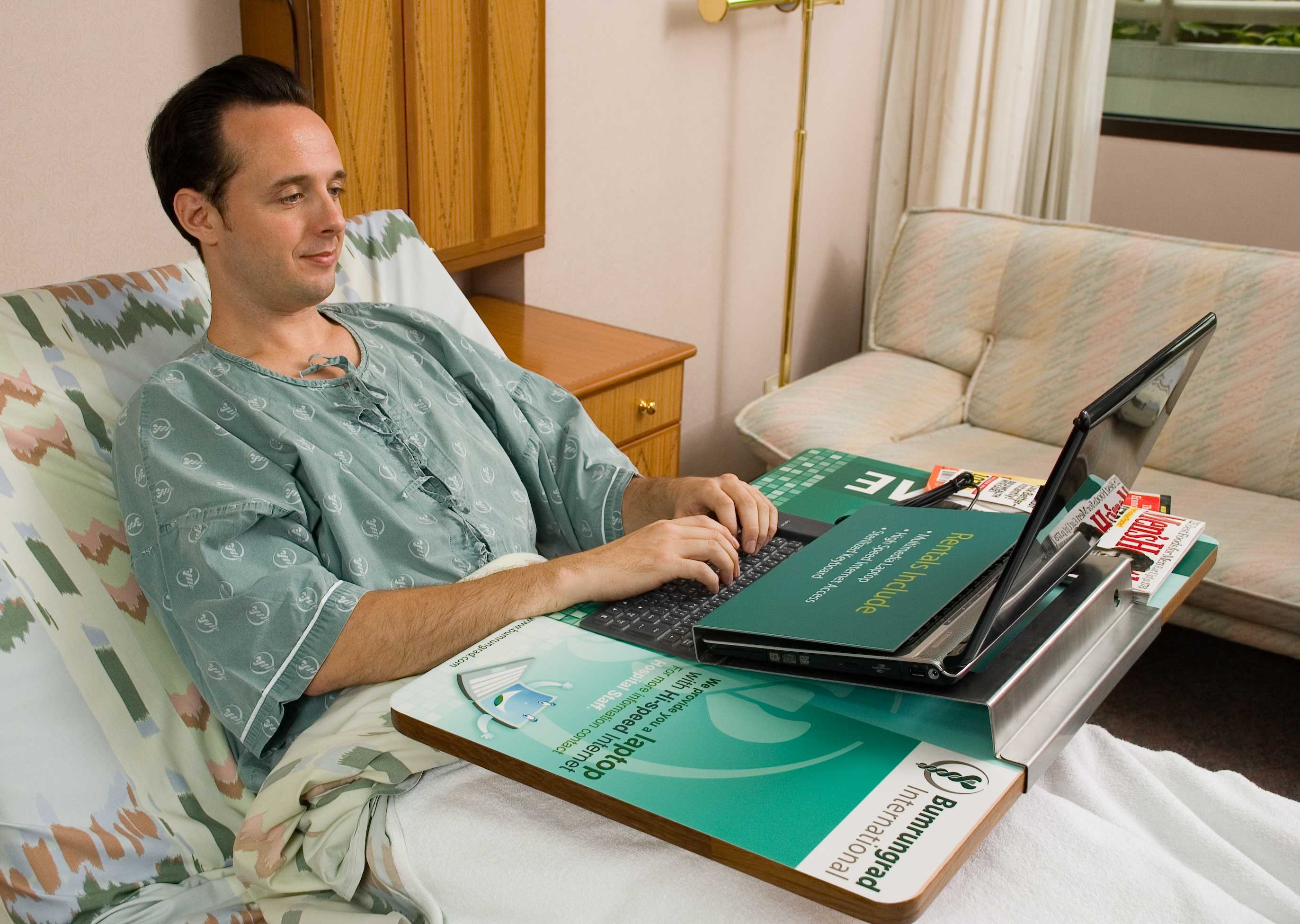 In one of the world’s most popular destinations for medical travellers, Thailand’s Bumrungrad International Thai Hospital helps bridge the gap – one of the downsides of a hospital stay is being somewhat isolated from family and friends – by offering patients rental of a unique laptop that’s custom-designed for hospital use.