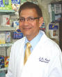 United Drugs Presents Pharmacist I.R. Patel with the Michael L. Huston...