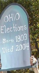 Sign at Funeral for Democracy, Nov. 2007, in front of Secretary of State Brunner&#039;s office, Columbus, Ohio. Eighteen months later, OEJC members now believe &quot;secret negotiations&quot; taking place over destroyed alleged election fraud evidence, public records that belong to the American people.