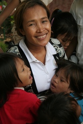 Somaly Mam with Children in Cambodia - Photo credit: Michael Angelo