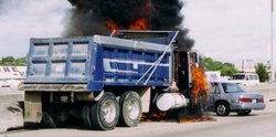 Truck and car fire on highway