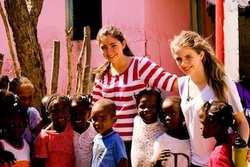 Kids to Kids Founder Julia Haney (far right) with children in the Dominican Republic