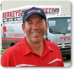 Berkey's president and licensed master plumber Bill Stevens with a Berkey's service truck.