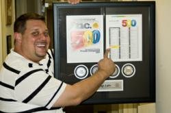 Nutricap Labs President and Founder, Jason Provenzano, shows off his 2011 Inc. 500 award