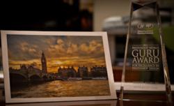 Photoshop Guru Awards Winning Photo and Trophy