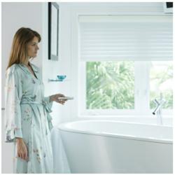 Motorized bathroom window coverings add convenience while preserving privacy and enhancing safety.