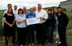 Hotspring World present a cheque to Make-A-Wish