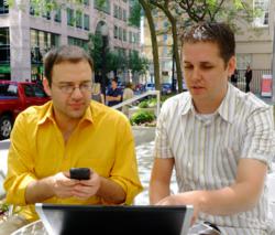 Digital Journal's David Silverberg (left) and Chris Hogg discuss the company's Global Editorial Meetings.