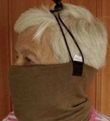 When you exhale, the air that was warmed while in your lungs passes out through the mask's metal heat exchanger. When you inhale outside air it moves through the now warm heat exchanger and that incoming breath of air is automatically warmed.