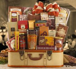 NEW! From our exclusive vintage travel collection. This fabulous gift is hand-crafted from solid wood embodying the elegance and sophistication of bygone travel… packed with an adventurous assortment of gourmet fare! A rendezvous of fabulous foods in our