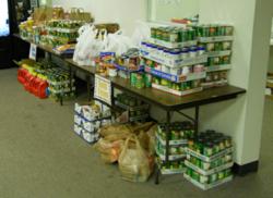Over 1,000 pounds of food was collected by Page 1 Solutions to benefit the Jeffco Action Center