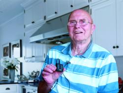 Peter Humphries with the ANM Neurostimulator used in the Acoustic CR® Neuromodulation treatment for tinnitus