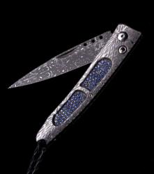 The 'Ventana' Pocketknife inlaid with 178 dark and light blue sapphires
