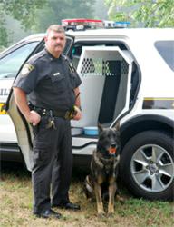 Officer and Canine Partner with Havis' Award-winning 2011 Ford Explorer K9 Transport System