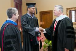 photo of Ryan Perrilloux receiving his degree from Jacksonville State University