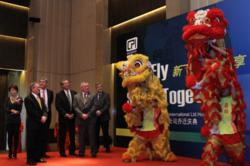 Members of CPI's Executive Team enjoy the impressive acrobatics and skill of the assembled dance troupe.