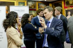 Guests conversing at the reception