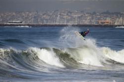Timmy taking flight to his next room on Surfbreak Rentals