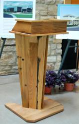 Crafted of white oak staves reclaimed from wine vats used at a Finger Lakes winery, the FLCC Student Center podium meets environmentally conscious requirements and offers rich history.
