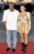 Kim Kardashian, Kanye West Exchange Kiss in Cannes