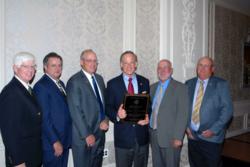 Senator Tom Carper receives "Friend of Agriculture" award by Farm Credit.