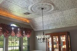 Victoria tin ceiling with a one foot design and a hand painted finish.