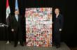 March 5, 2012 - Ambassador Al-Bayati of Iraq presents UN Secretary General Ban-Ki Moon with a wall of happiness by Artist Joseph Peter during a luncheon for UN Women.