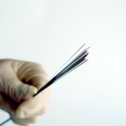 Teflon coated medical guidewire with tight tolerances