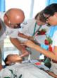 Lupe and other Alliance for Smiles volunteers perform surgery on Chinese child