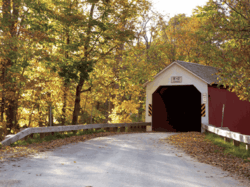 Photo of Eagleville Covered Bridge and Fall Foliage. Credit: Sara Kelly