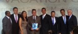 Photo of All Inclusive Outlet President Accepting Award