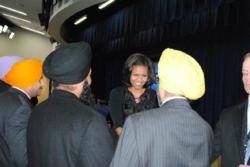 Picture by Sonia Bhagat: Mitchelle Obama Shaking hands with Dr. Rajwant Singh, standing next are Raghuvinder Singh (Son of Baba Punjab Singh), Gurmail Singh (Son of Baba Santokh Singh)