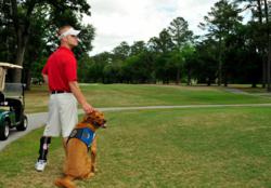 DeBevoise with his service dog, Rusty