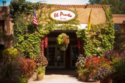 The entry to Albuquerque's Historic El Pinto Restaurant in New Mexico invites guests to enjoy a memorable dining experience.