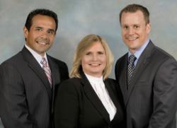 Michael Hernandez, CFP, Barbara Stowell and Shawn Hochuli of IWM Partners