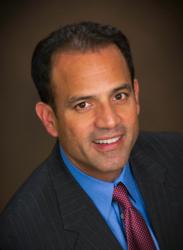 Professional headshot for Glenn Ayala, Director of Global Business Development for TTS.