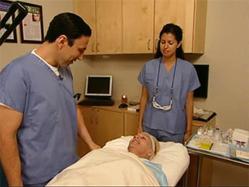 Dr. Simon Ourian Examining a patient