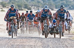 Riders begin competition.