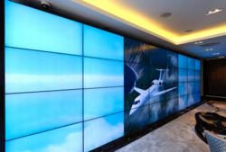 The Jet Business deploys 32-monitor Mura MPX-powered video wall controlled using Mura Network Application Programming Interface.