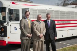 From left: Bart Gorbeil, chief operating officer with the State of Georgia; Brian Owens, commissioner of the Georgia Department of Corrections; and Phil Horlock, president & CEO of Blue Bird, in front of the first 2014 All American Blue Bird bus.