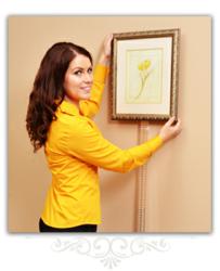 Once satisfied with the location, remove the picture, mark the anchor location, install the anchor and hang the picture.