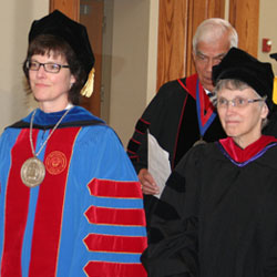 United President Wendy Deichmann and Bishop Peggy Johnson of the Philadelphia Area of the UMC walk in the processional during United's Spring Commencement.