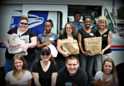 Resolution Systems, Inc. Team Joins the Salvation Army of Greensboro for the 'Stamp Out Hunger' Campaign
