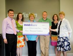 Mentoring Minds Awards MindSHARE Check to Bethesda Health Clinic