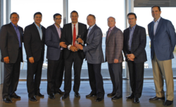Torsten Poels, CEO & Chairman of the Board of Fast Lane accepts the Cisco Global Learning Partner of the Year award from John Chambers, Chairman & CEO of Cisco.