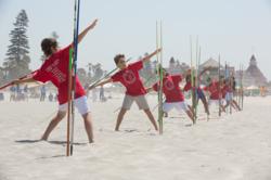 Students line up with javelins, ready to throw in a competition at the 2013 Southern California Waldorf School Pentathlon