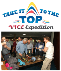 Austin Lines talks to KMC Systems employees about the Take It To The Top expedition.
