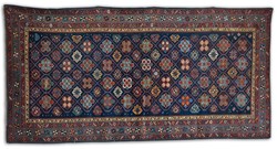 Antique Caucasian Shirvan circa 1920s. Shirvan is situated in the Caucuses - this carpet is finely knotted using 100% natural vegetable dyes in vivid reds, blues, gold, brown and green in all over Star design