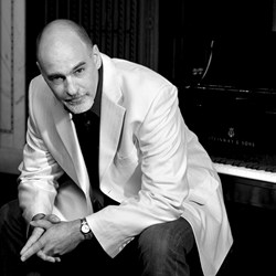 Jazz pianist Jeremy Kahn performs at the Summer Jazz Festival at the Oak Park Arms retirement community.
